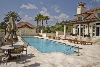 Experience waterfront living at its finest in this elegant on Pablo Creek Club in Florida - for sale on GolfHomes.com, golf home, golf lot