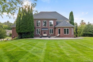 Welcome to this 3000 square foot Brick Colonial, perfectly on Paint Creek Country Club in Michigan - for sale on GolfHomes.com, golf home, golf lot