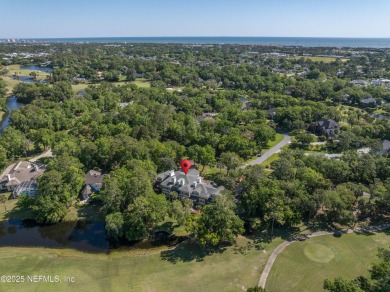 Experience refined living in this stunning Georgian Revival home on Marsh Landing Country Club - Saint Johns County in Florida - for sale on GolfHomes.com, golf home, golf lot