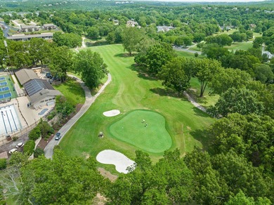Turnkey opportunity in a highly sought-after gated golf on Pointe Royale Village Country Club in Missouri - for sale on GolfHomes.com, golf home, golf lot