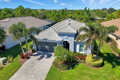 Welcome to this contemporary 4-bedroom, 2-bath, 2-car garage on Esplanade Golf and Country at Lakewood Ranch in Florida - for sale on GolfHomes.com, golf home, golf lot
