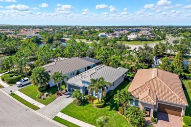 Welcome to this contemporary 4-bedroom, 2-bath, 2-car garage on Esplanade Golf and Country at Lakewood Ranch in Florida - for sale on GolfHomes.com, golf home, golf lot