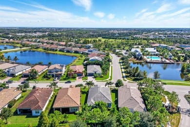 Welcome to this contemporary 4-bedroom, 2-bath, 2-car garage on Esplanade Golf and Country at Lakewood Ranch in Florida - for sale on GolfHomes.com, golf home, golf lot