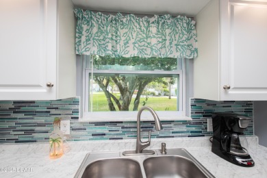 This is the TIME TO BUY ! - This meticulously maintained on New Smyrna Beach Golf Course in Florida - for sale on GolfHomes.com, golf home, golf lot