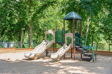 Turnkey opportunity in a highly sought-after gated golf on Pointe Royale Village Country Club in Missouri - for sale on GolfHomes.com, golf home, golf lot