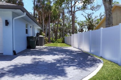 HOME OF YOUR DREAMS!  PRICE TO SELL!
FULLY REMODELED 2024-2025 on Jacaranda West Country Club in Florida - for sale on GolfHomes.com, golf home, golf lot