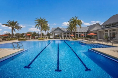 Welcome to this contemporary 4-bedroom, 2-bath, 2-car garage on Esplanade Golf and Country at Lakewood Ranch in Florida - for sale on GolfHomes.com, golf home, golf lot