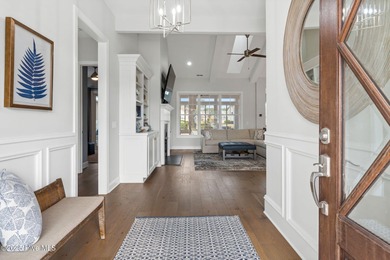 Modern luxury meets serene golf-course living in this immaculate on Members Club At St. James Plantation in North Carolina - for sale on GolfHomes.com, golf home, golf lot