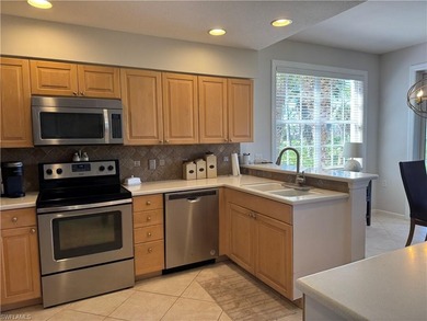 Welcome to this beautifully maintained first-floor end-unit on Crown Colony Golf and Country Club in Florida - for sale on GolfHomes.com, golf home, golf lot