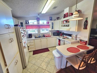 METICULOUS MAINTAINED HOME ON A PRIVATE CORNER LOT!!! This fully on Riverbend Golf and Country Club in Florida - for sale on GolfHomes.com, golf home, golf lot