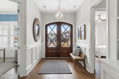 Modern luxury meets serene golf-course living in this immaculate on Members Club At St. James Plantation in North Carolina - for sale on GolfHomes.com, golf home, golf lot