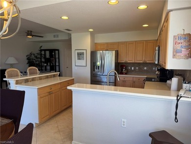 Welcome to this beautifully maintained first-floor end-unit on Crown Colony Golf and Country Club in Florida - for sale on GolfHomes.com, golf home, golf lot