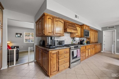Beautifully updated Kern City home overlooking the 2nd hole of on Sundale Country Club in California - for sale on GolfHomes.com, golf home, golf lot