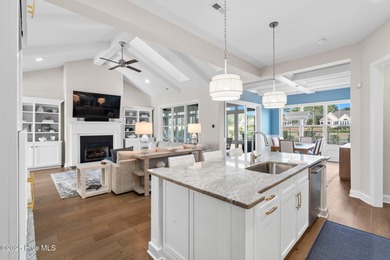 Modern luxury meets serene golf-course living in this immaculate on Members Club At St. James Plantation in North Carolina - for sale on GolfHomes.com, golf home, golf lot