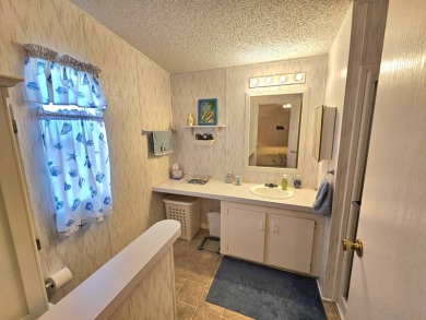 METICULOUS MAINTAINED HOME ON A PRIVATE CORNER LOT!!! This fully on Riverbend Golf and Country Club in Florida - for sale on GolfHomes.com, golf home, golf lot