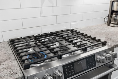 Modern luxury meets serene golf-course living in this immaculate on Members Club At St. James Plantation in North Carolina - for sale on GolfHomes.com, golf home, golf lot