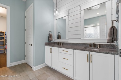 Modern luxury meets serene golf-course living in this immaculate on Members Club At St. James Plantation in North Carolina - for sale on GolfHomes.com, golf home, golf lot