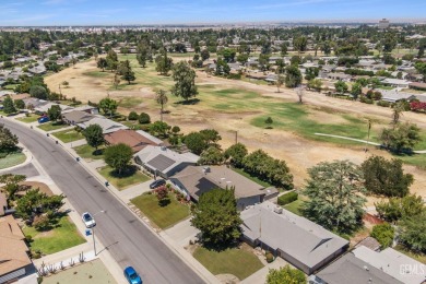 Beautifully updated Kern City home overlooking the 2nd hole of on Sundale Country Club in California - for sale on GolfHomes.com, golf home, golf lot