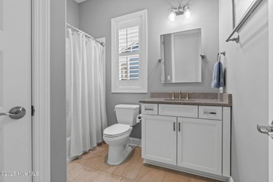 Modern luxury meets serene golf-course living in this immaculate on Members Club At St. James Plantation in North Carolina - for sale on GolfHomes.com, golf home, golf lot