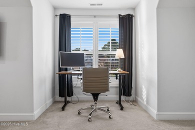 Modern luxury meets serene golf-course living in this immaculate on Members Club At St. James Plantation in North Carolina - for sale on GolfHomes.com, golf home, golf lot