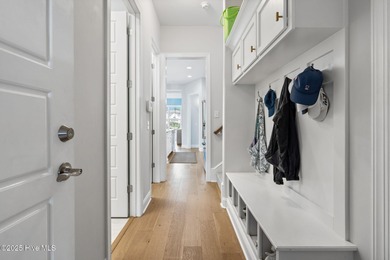 Modern luxury meets serene golf-course living in this immaculate on Members Club At St. James Plantation in North Carolina - for sale on GolfHomes.com, golf home, golf lot