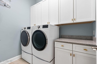 Modern luxury meets serene golf-course living in this immaculate on Members Club At St. James Plantation in North Carolina - for sale on GolfHomes.com, golf home, golf lot