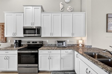 FULL GOLF MEMBERSHIP INCLUDED. PREMIER END UNIT CONDOMINIUM ON on Esplanade Golf and Country at Lakewood Ranch in Florida - for sale on GolfHomes.com, golf home, golf lot