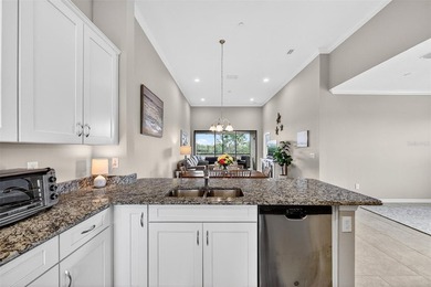 FULL GOLF MEMBERSHIP INCLUDED. PREMIER END UNIT CONDOMINIUM ON on Esplanade Golf and Country at Lakewood Ranch in Florida - for sale on GolfHomes.com, golf home, golf lot