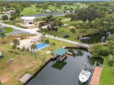 PRICE IMPROVEMENT! Your Waterfront Oasis awaits with this Canal on Plantation Inn and Golf Resort  in Florida - for sale on GolfHomes.com, golf home, golf lot