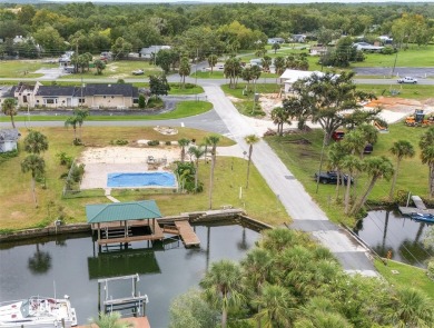 PRICE IMPROVEMENT! Your Waterfront Oasis awaits with this Canal on Plantation Inn and Golf Resort  in Florida - for sale on GolfHomes.com, golf home, golf lot