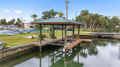 PRICE IMPROVEMENT! Your Waterfront Oasis awaits with this Canal on Plantation Inn and Golf Resort  in Florida - for sale on GolfHomes.com, golf home, golf lot