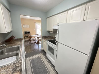 WELCOME TO YOUR SLICE OF PARADISE. THIS BEAUTIFUL 3 BEDROOM on Marysville Golf Course in Michigan - for sale on GolfHomes.com, golf home, golf lot