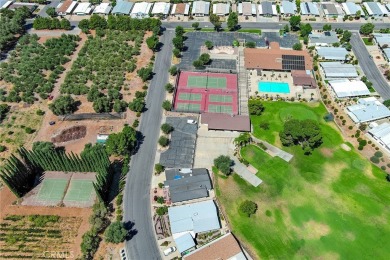 Welcome Home to 10765 Chisholm Trail in Cherry Valley! If you're on Highland Springs Village Golf Course in California - for sale on GolfHomes.com, golf home, golf lot