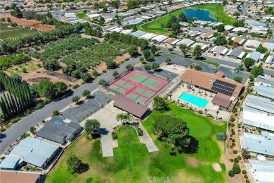 Welcome Home to 10765 Chisholm Trail in Cherry Valley! If you're on Highland Springs Village Golf Course in California - for sale on GolfHomes.com, golf home, golf lot