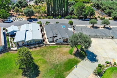 Welcome Home to 10765 Chisholm Trail in Cherry Valley! If you're on Highland Springs Village Golf Course in California - for sale on GolfHomes.com, golf home, golf lot