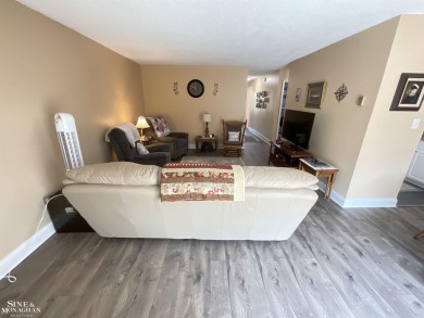 WELCOME TO YOUR SLICE OF PARADISE. THIS BEAUTIFUL 3 BEDROOM on Marysville Golf Course in Michigan - for sale on GolfHomes.com, golf home, golf lot