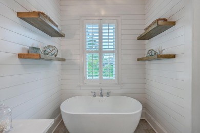 Welcome to this elevated 5-bedroom, 4.5-bathroom coastal retreat on Wild Dunes Harbor Golf Resort in South Carolina - for sale on GolfHomes.com, golf home, golf lot