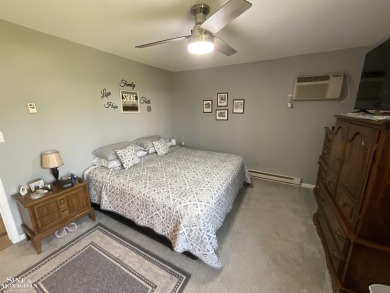 WELCOME TO YOUR SLICE OF PARADISE. THIS BEAUTIFUL 3 BEDROOM on Marysville Golf Course in Michigan - for sale on GolfHomes.com, golf home, golf lot