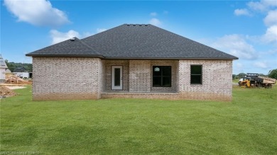 This charming 3-bedroom, 2-bathroom home by K.C. Colley on Vache-Grasse Country Club in Arkansas - for sale on GolfHomes.com, golf home, golf lot