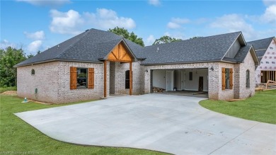 This charming 3-bedroom, 2-bathroom home by K.C. Colley on Vache-Grasse Country Club in Arkansas - for sale on GolfHomes.com, golf home, golf lot