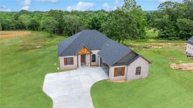 This charming 3-bedroom, 2-bathroom home by K.C. Colley on Vache-Grasse Country Club in Arkansas - for sale on GolfHomes.com, golf home, golf lot