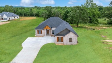 This charming 3-bedroom, 2-bathroom home by K.C. Colley on Vache-Grasse Country Club in Arkansas - for sale on GolfHomes.com, golf home, golf lot