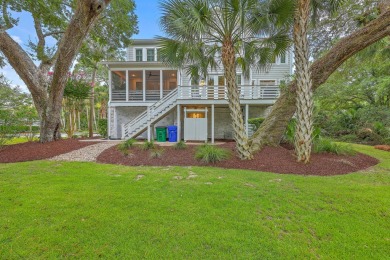 Welcome to this elevated 5-bedroom, 4.5-bathroom coastal retreat on Wild Dunes Harbor Golf Resort in South Carolina - for sale on GolfHomes.com, golf home, golf lot