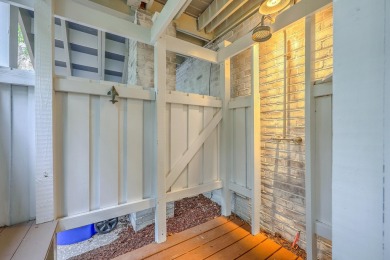 Welcome to this elevated 5-bedroom, 4.5-bathroom coastal retreat on Wild Dunes Harbor Golf Resort in South Carolina - for sale on GolfHomes.com, golf home, golf lot