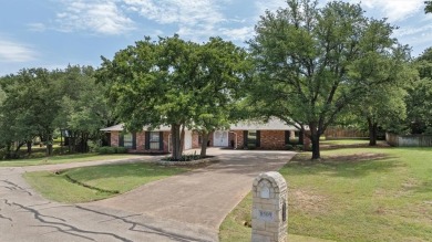 Classy and classic ranch style house nestled in Pecan Plantation on Pecan Plantation Country Club in Texas - for sale on GolfHomes.com, golf home, golf lot