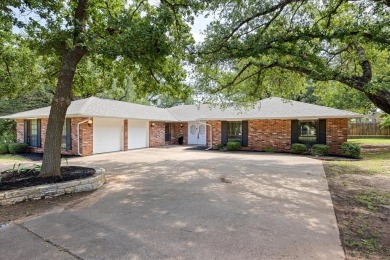 Classy and classic ranch style house nestled in Pecan Plantation on Pecan Plantation Country Club in Texas - for sale on GolfHomes.com, golf home, golf lot