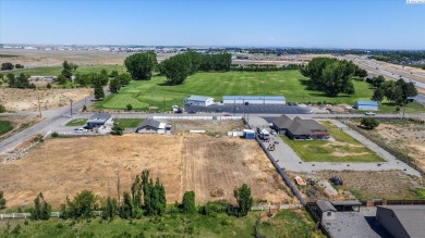 How would you like to walk across the street to Pasco Golfland? on Pasco Golfland in Washington - for sale on GolfHomes.com, golf home, golf lot