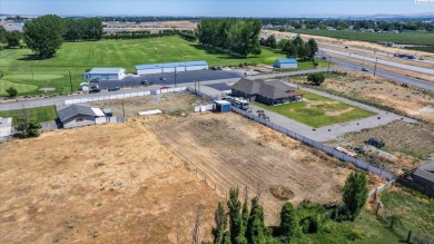 How would you like to walk across the street to Pasco Golfland? on Pasco Golfland in Washington - for sale on GolfHomes.com, golf home, golf lot