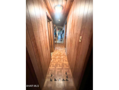 Located on a sprawling one-acre lot, this bi-level home offers on Iron Masters Country Club in Pennsylvania - for sale on GolfHomes.com, golf home, golf lot