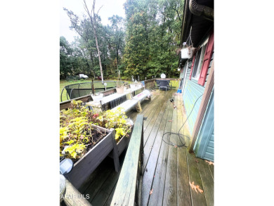 Located on a sprawling one-acre lot, this bi-level home offers on Iron Masters Country Club in Pennsylvania - for sale on GolfHomes.com, golf home, golf lot